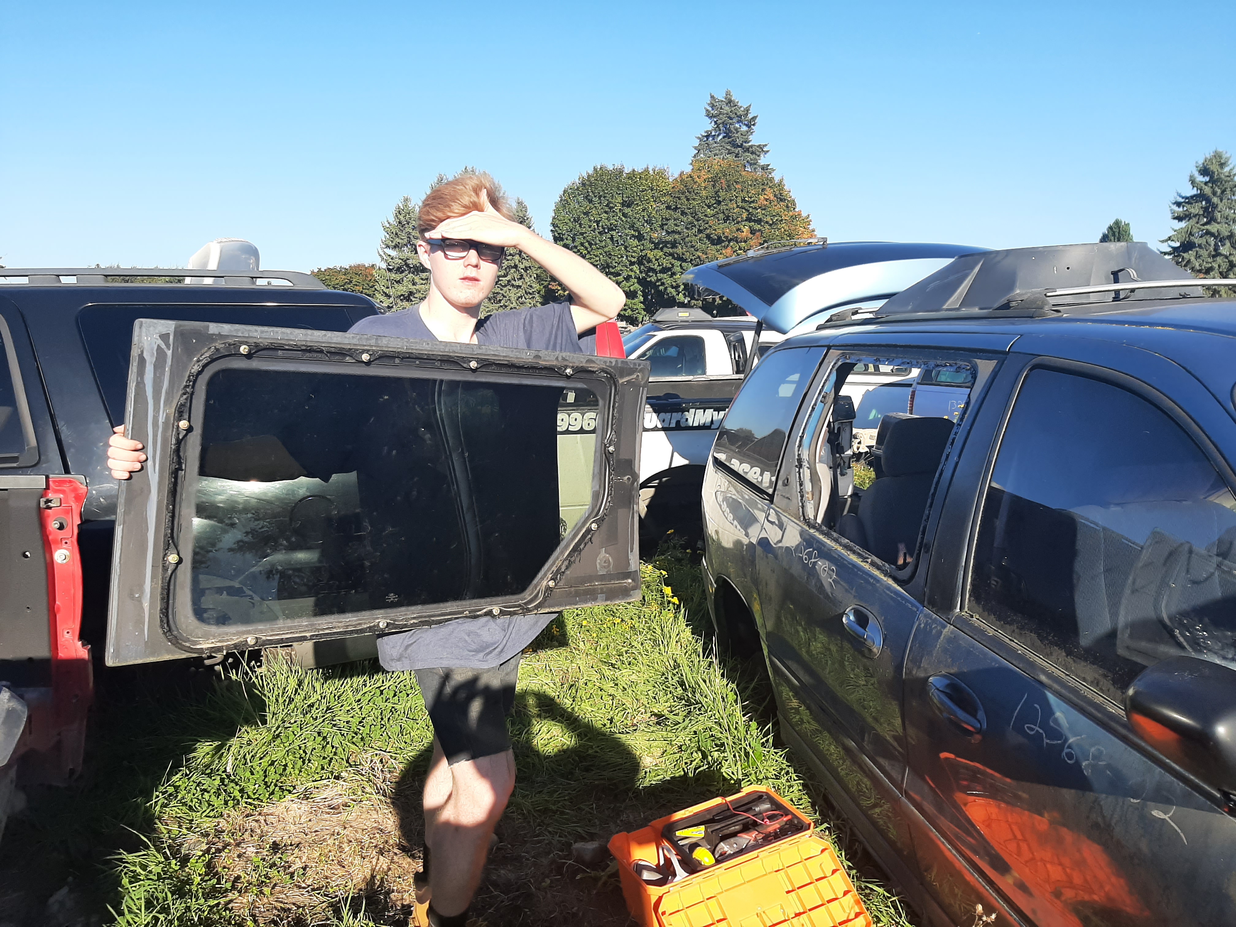 Thomas helping to remove the window.